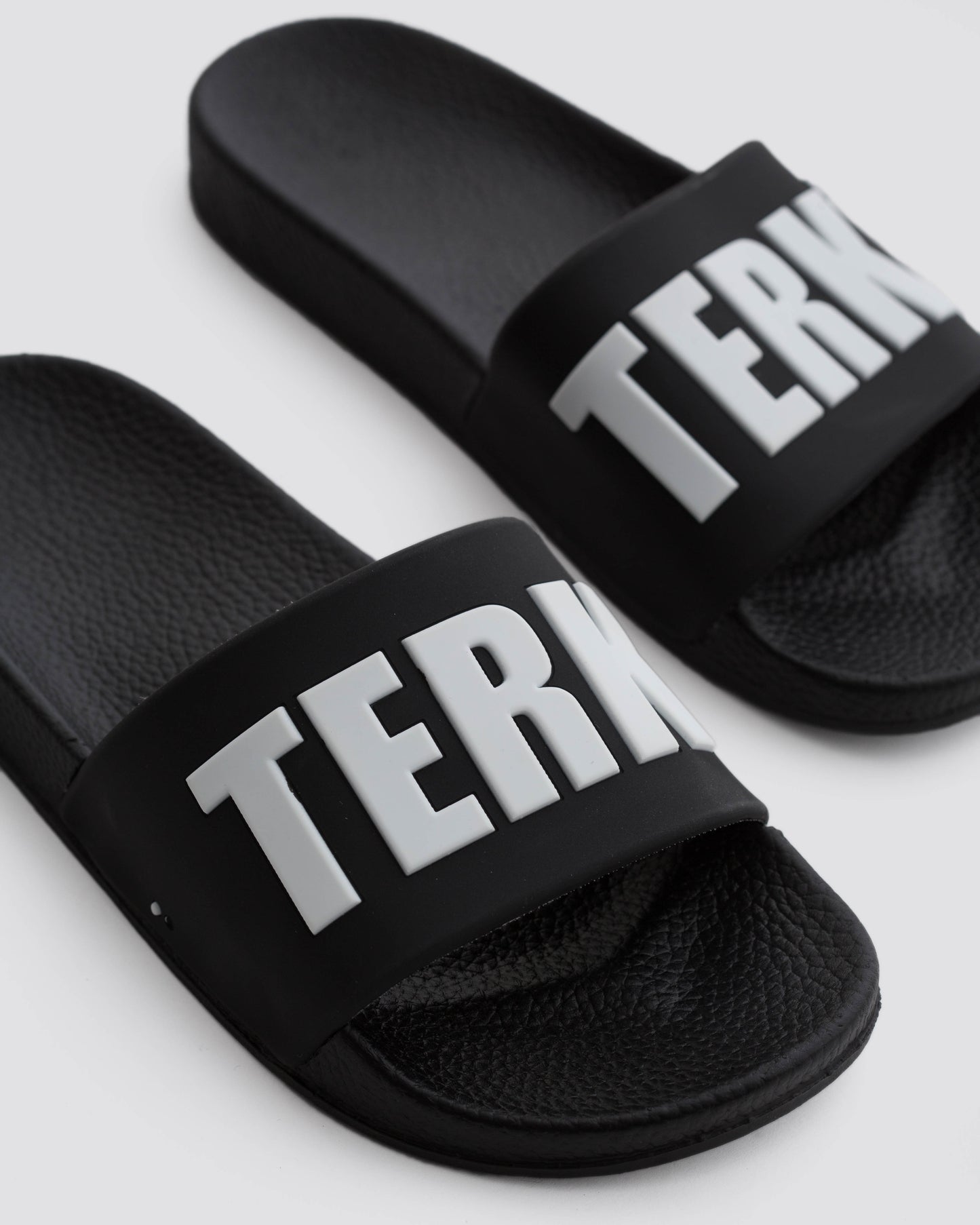 BLACK 3D WHITE TERK LOGO SLIDE