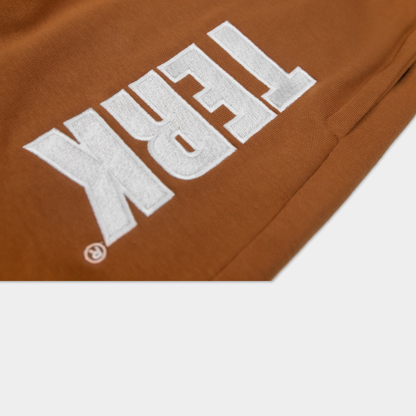 SADDLE SOLID SWEAT SHORTS WITH WHITE TERK EMBROIDERED LOGO