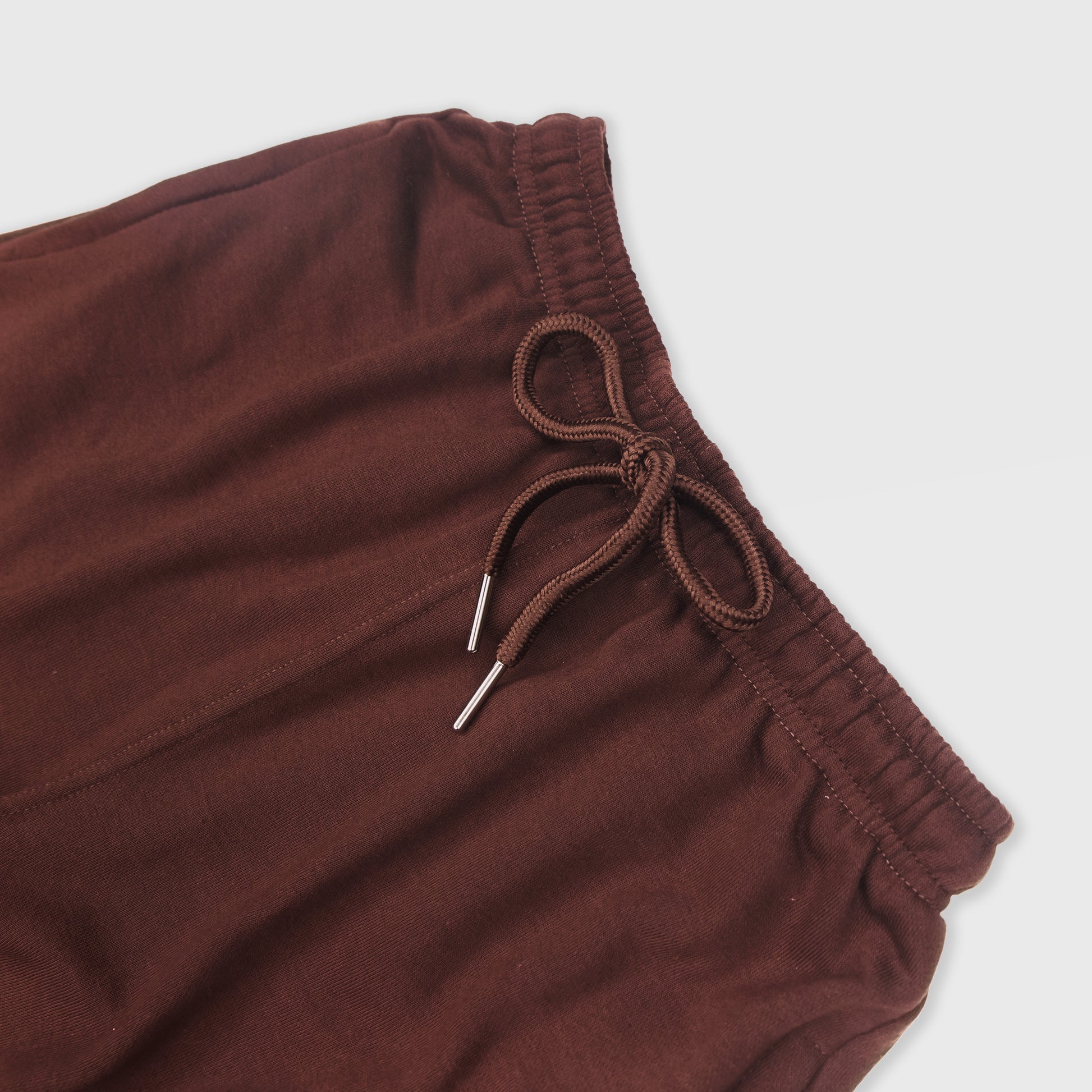 CHOCOLATE SWEATPANTS WITH WHITE TERK EMBROIDERED LOGO