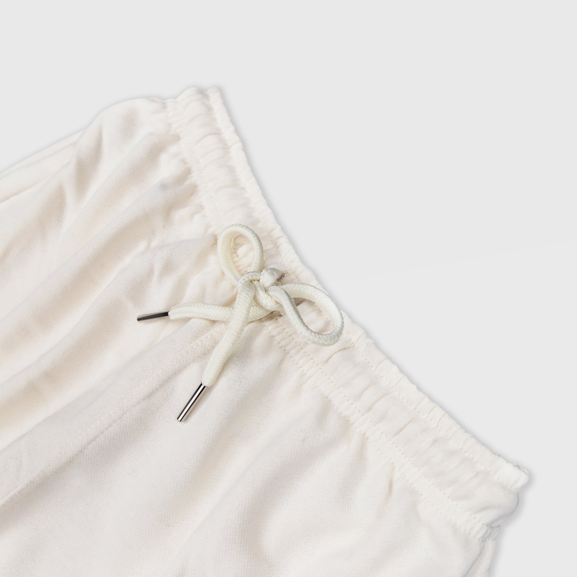 VANILLA SWEATPANTS WITH WHITE TERK EMBROIDERED LOGO